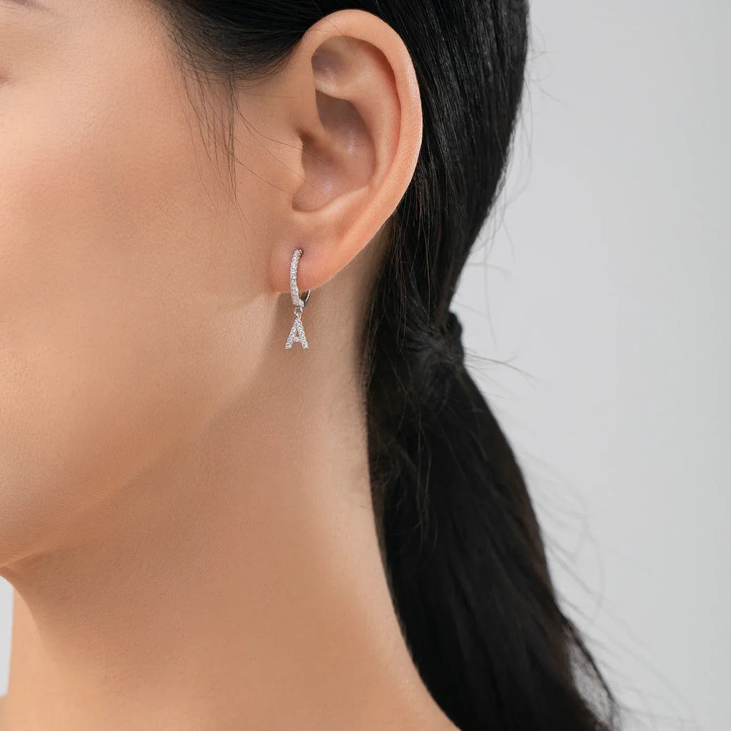 Huggie earrings with initial a