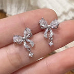 Women's silver bow earrings