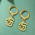 Drop earrings with the Chai symbol of life on a gold crescent moon