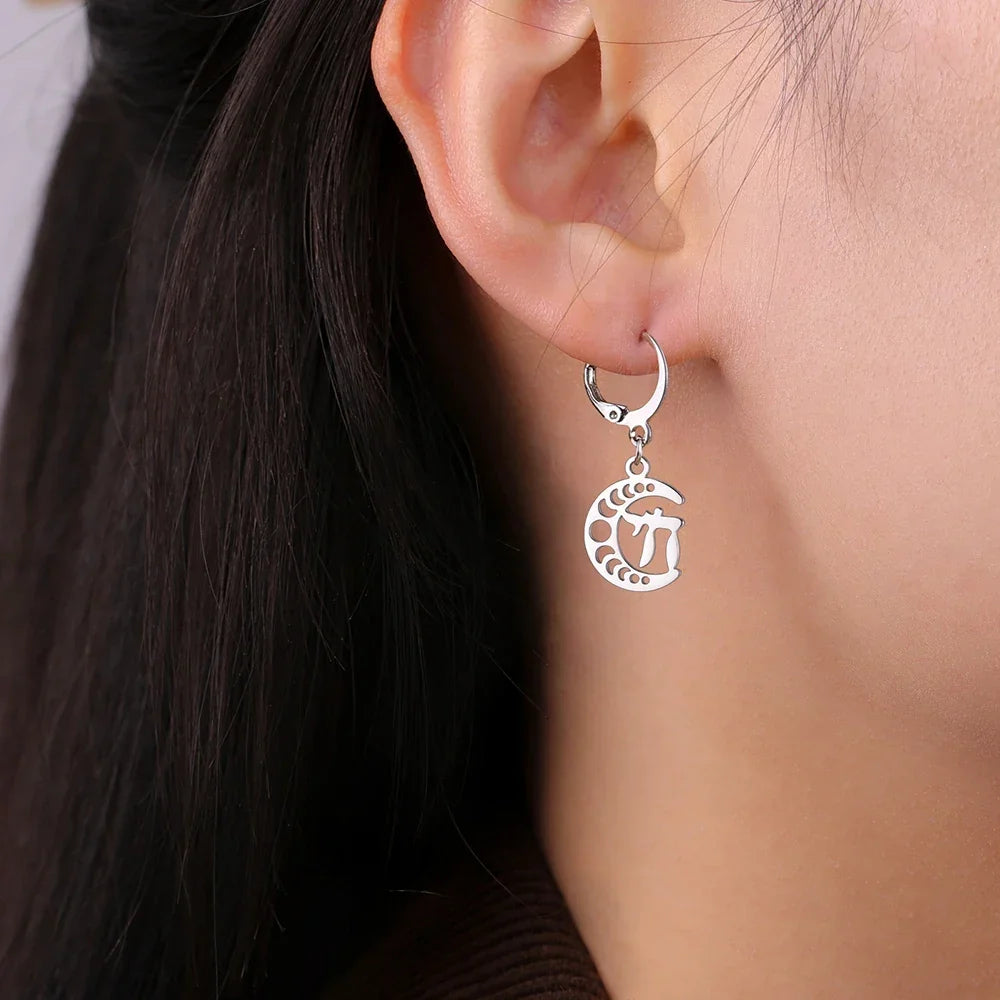 Drop earrings with the Chai symbol of life on a silver crescent moon