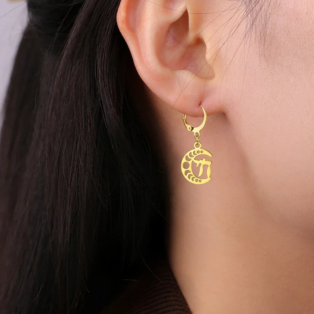 Drop earrings with the Chai symbol of life on a gold crescent moon