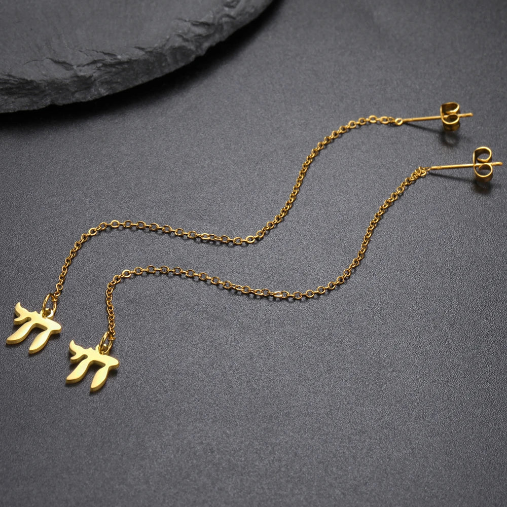 Dangling earrings with the Jewish life symbol Chai in gold
