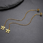 Dangling earrings with the Jewish life symbol Chai in gold