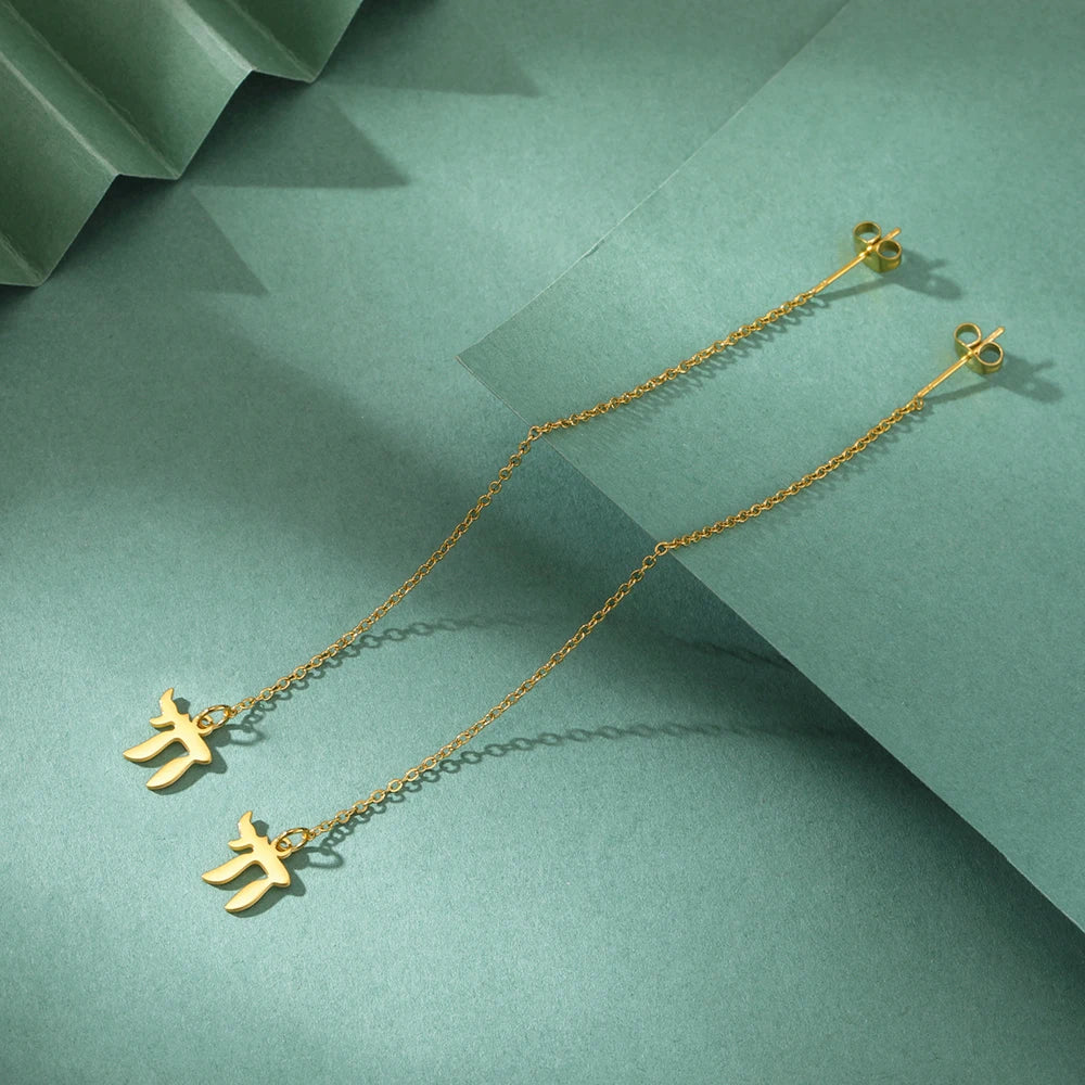 Dangling earrings with the Jewish life symbol Chai in gold