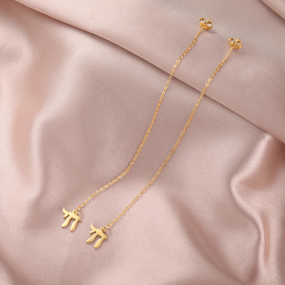 Dangling earrings with the Jewish life symbol Chai in gold