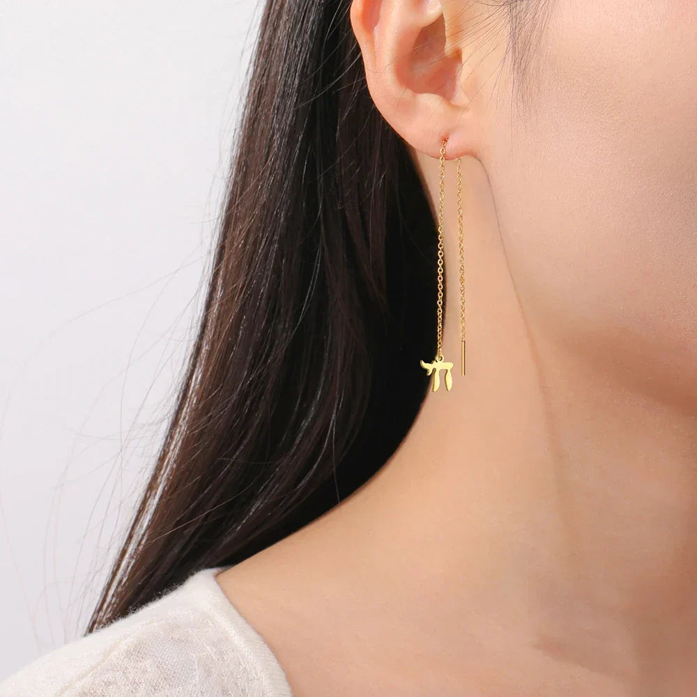 Dangling earrings with the Jewish life symbol Chai in gold