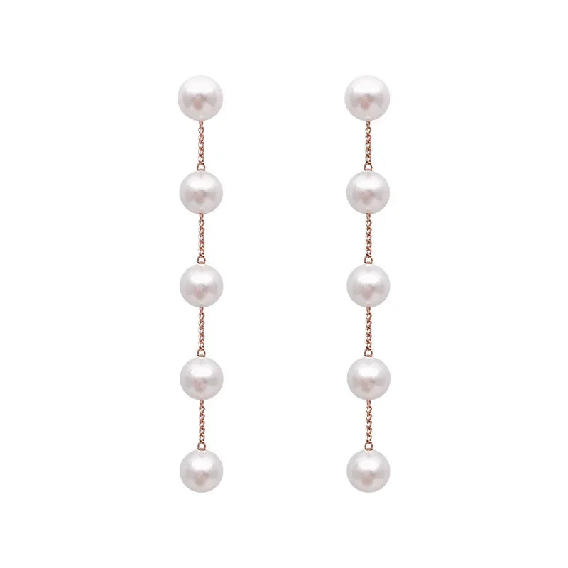 Dangling Earrings with White Pearls