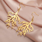 Dangling Earrings in Gold Coral Branches