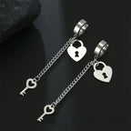 Silver key and lock dangling earrings