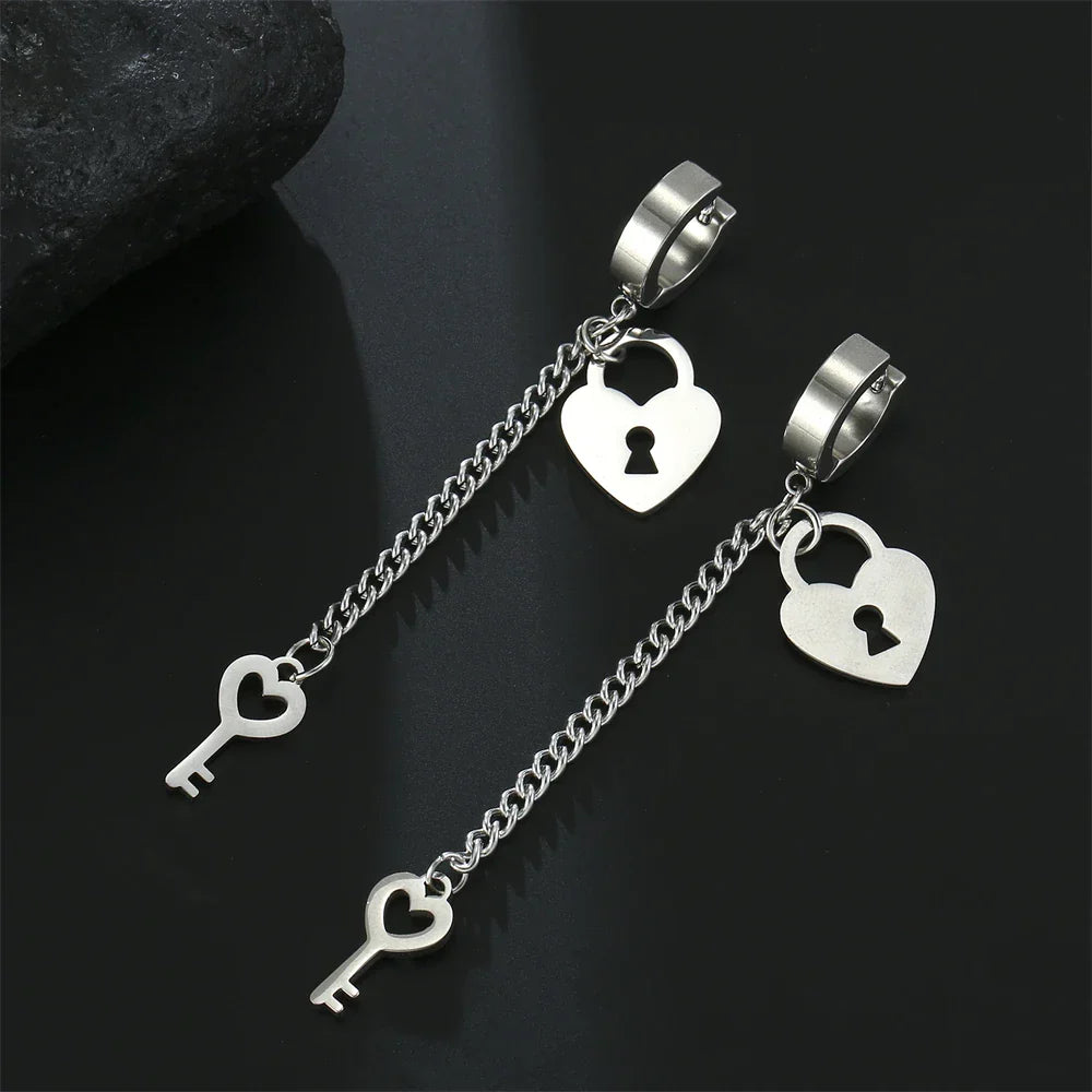Silver key and lock dangling earrings