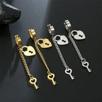 Gold key and lock dangling earrings