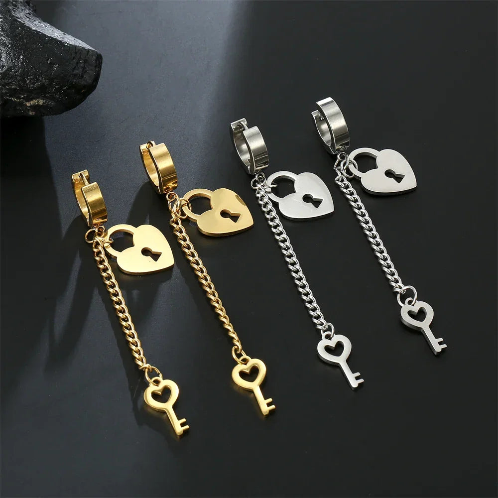 Gold key and lock dangling earrings