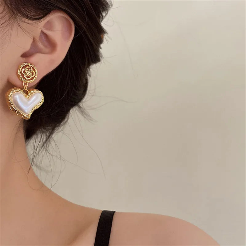 Women's Gold Heart Dangle Earrings