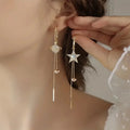 Star and Planet Dangling Earrings