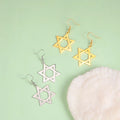 Hexagonal drop earrings with the Jewish Star of David symbol in gold