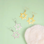 Hexagonal drop earrings with the Jewish Star of David symbol in gold