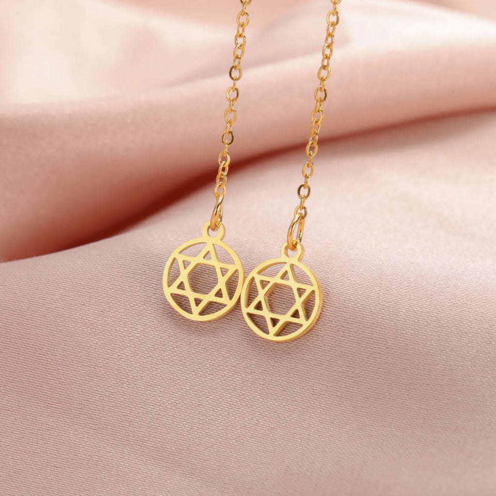 Long drop earrings with the Star of David Jewish symbol in round gold