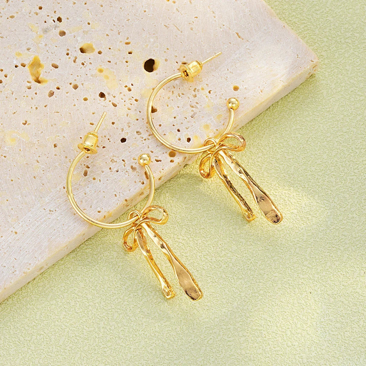 Bow tie drop earrings