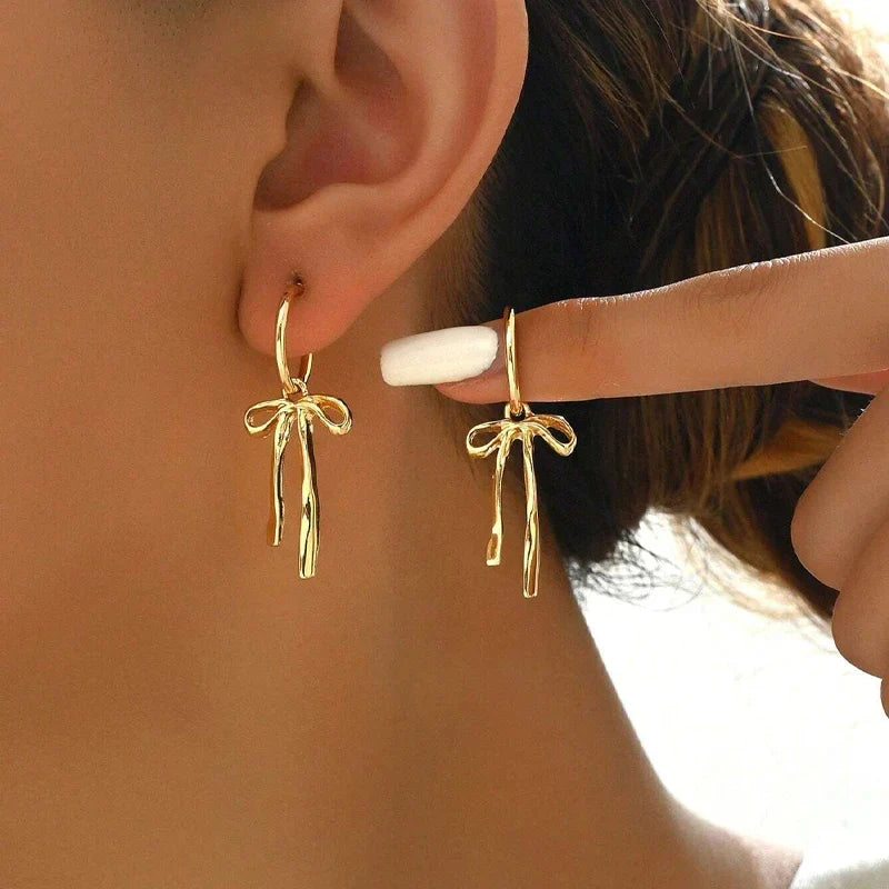 Bow tie drop earrings