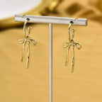 Bow tie drop earrings