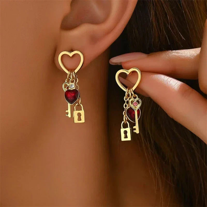 Women’s dangle earrings with keys and padlocks