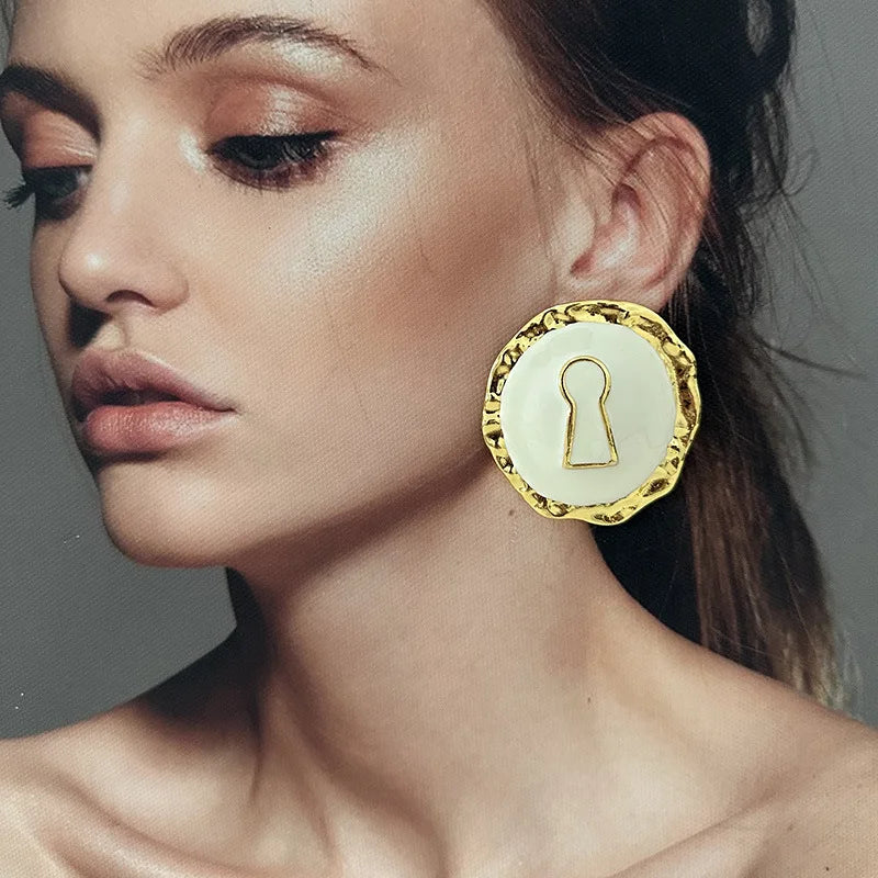 Round white key hoop earrings