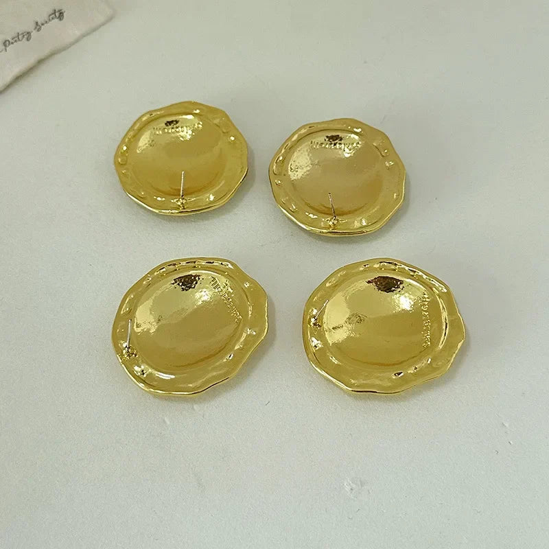 Round key hoop earrings