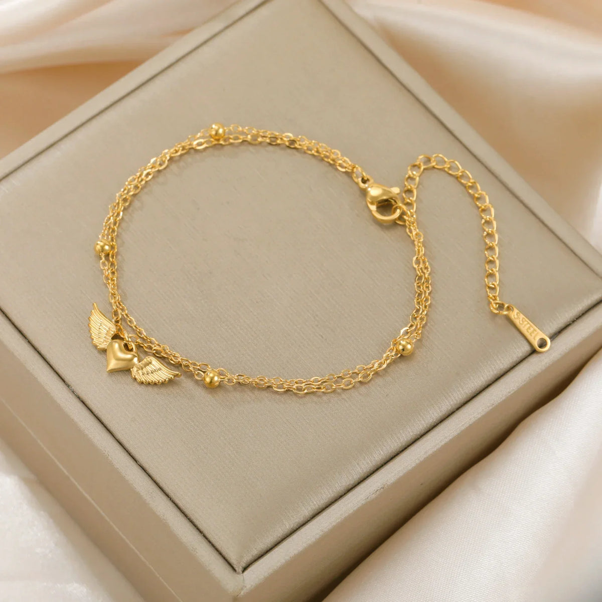 Adjustable angel wings bracelet gold