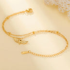 Adjustable angel wings bracelet gold