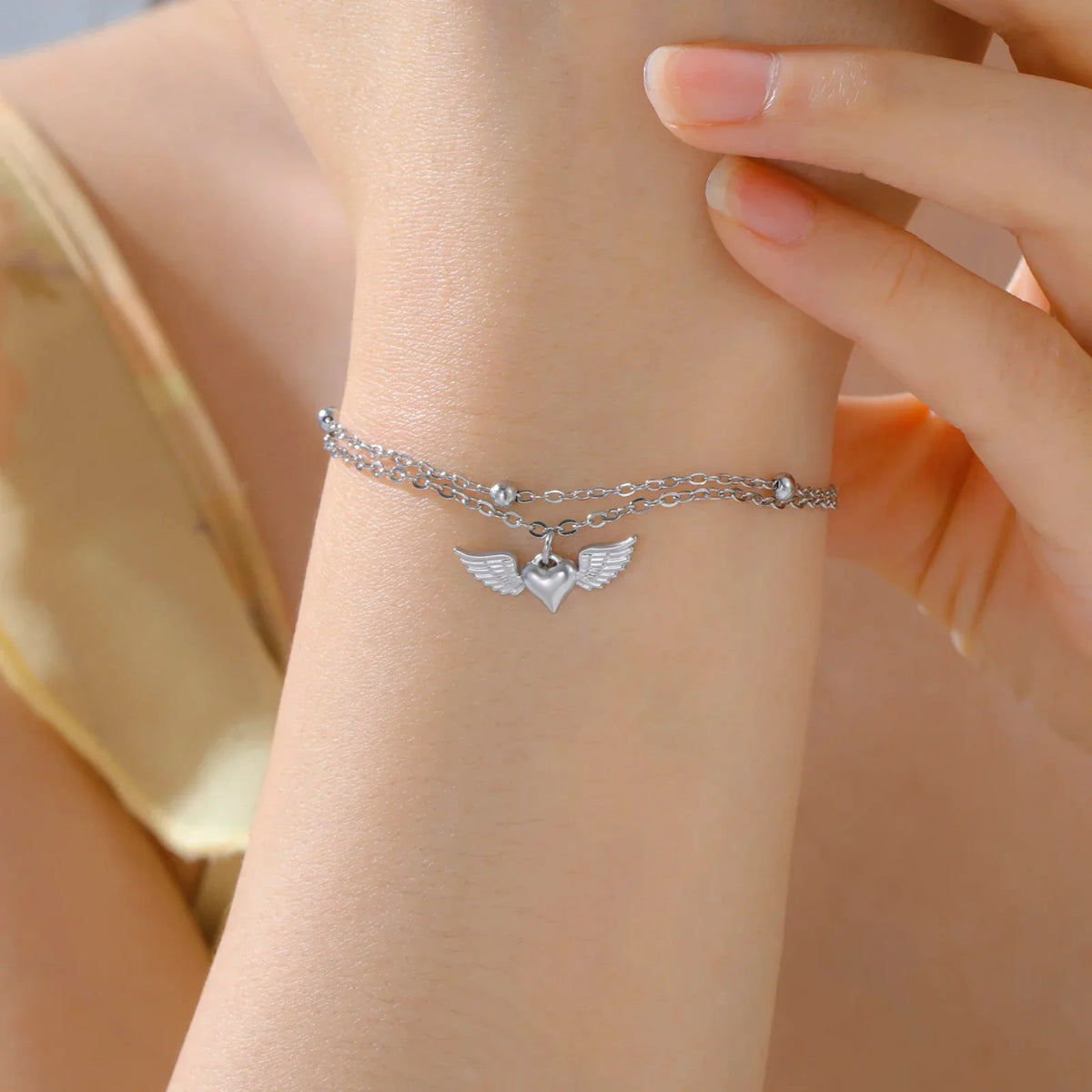 Adjustable angel wings bracelet silver