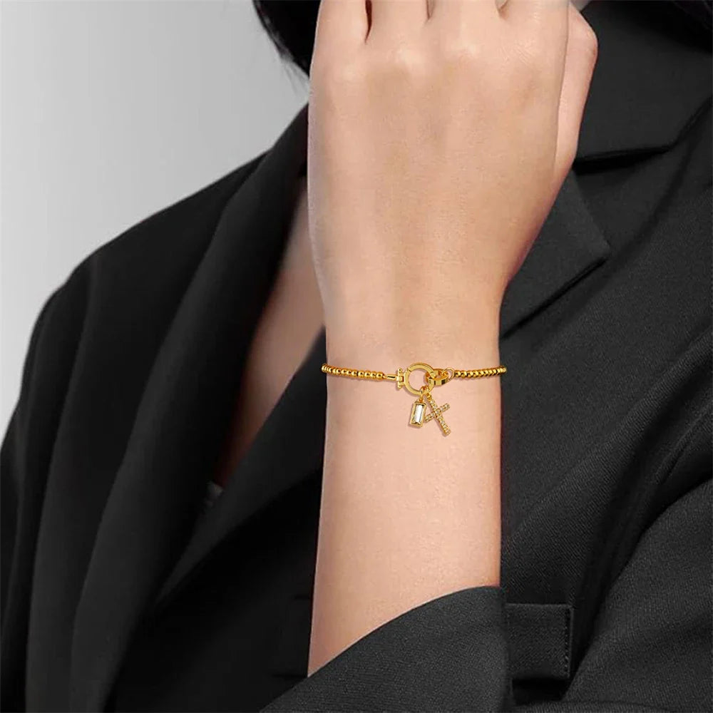 Bracelet with cross and birthstone