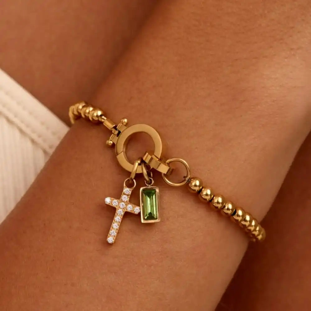 Bracelet with cross and December birthstone