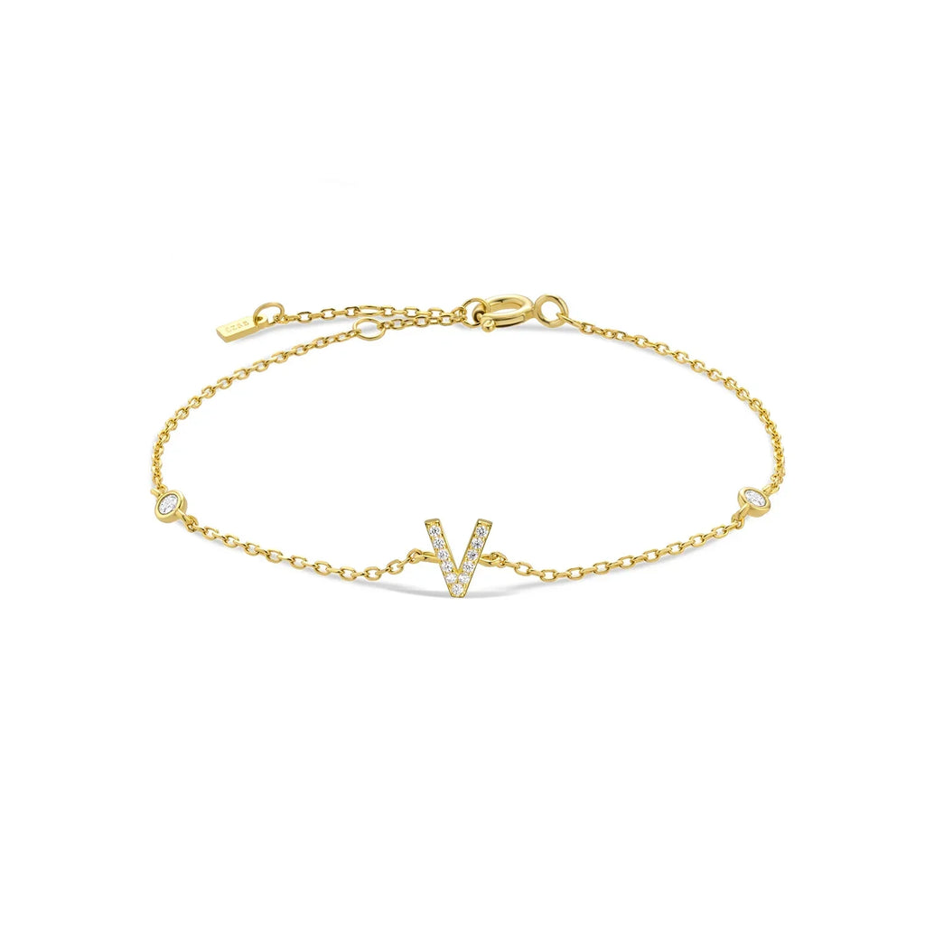 Bracelet with gold rhinestone initial v