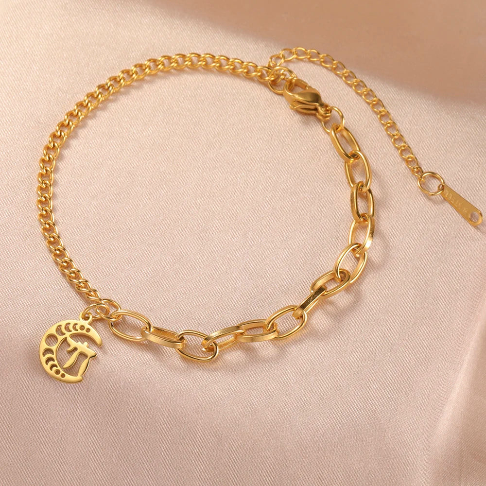 Bracelet with the Jewish protection symbol Chai on a gold crescent moon