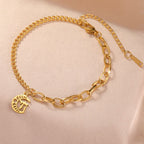 Bracelet with the Jewish protection symbol Chai on a gold crescent moon