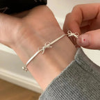 Silver women's bow bracelet

