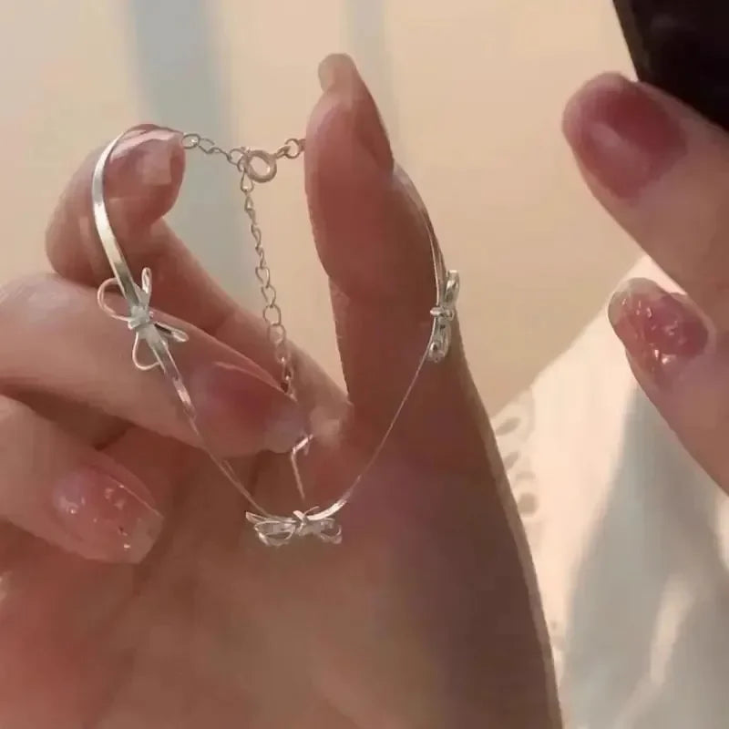 Silver women's bow bracelet