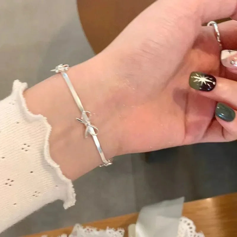 Silver women's bow bracelet