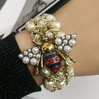 Bracelet with blue bee beads