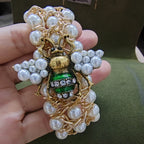 Bracelet with green bee beads