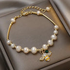 Bracelet with white bead bee