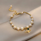 Bracelet with white bead bee