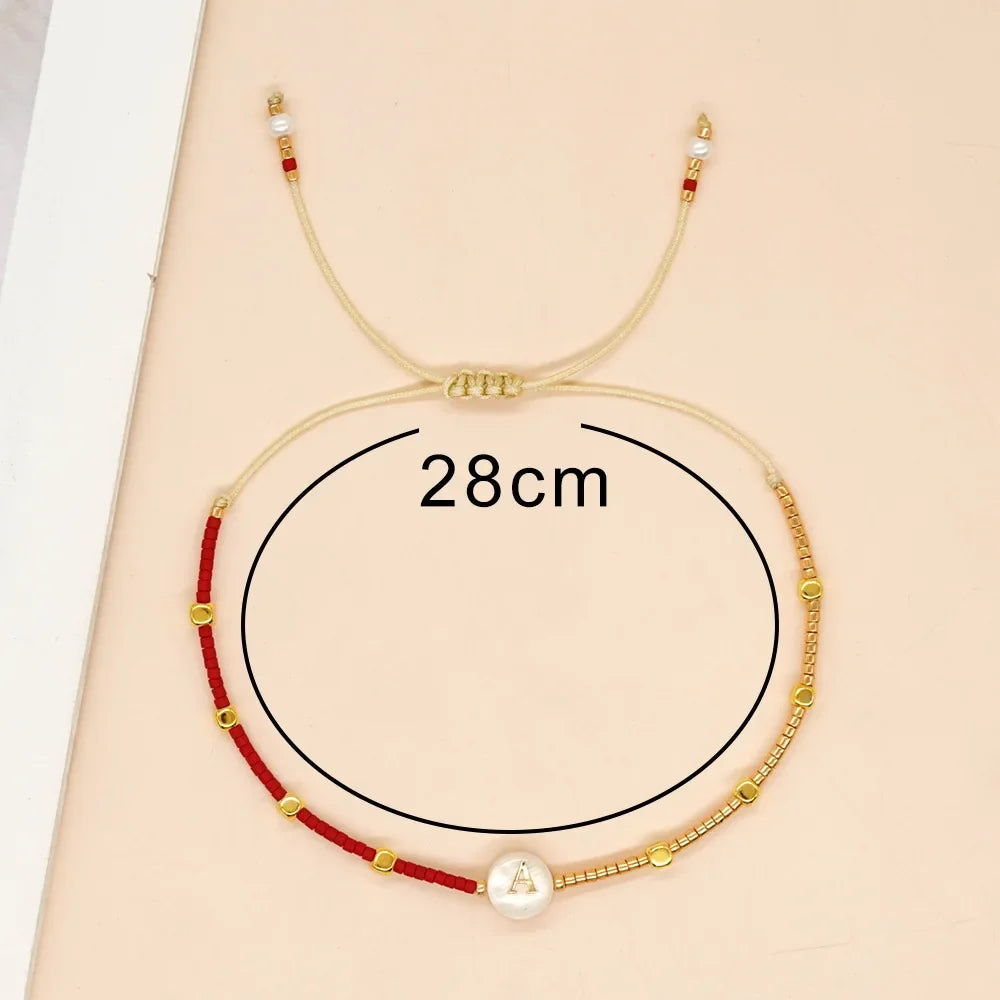 Two-tone initial bracelet