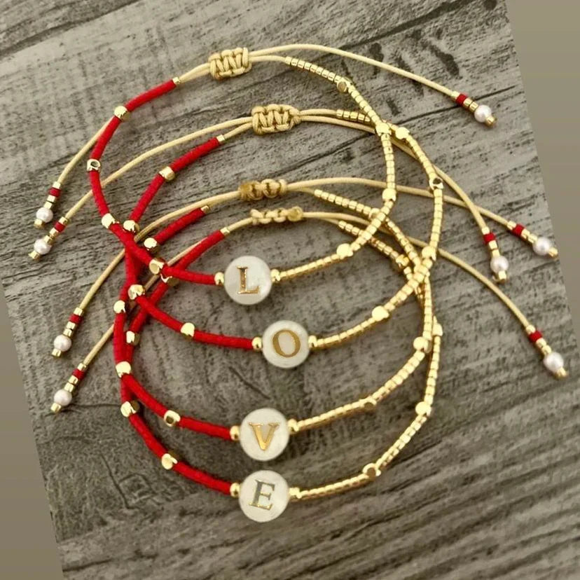 Two-tone initial bracelet o