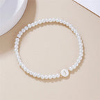 White initial bracelet j