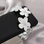 Women's arm bracelet - silver flower petal bicep chain