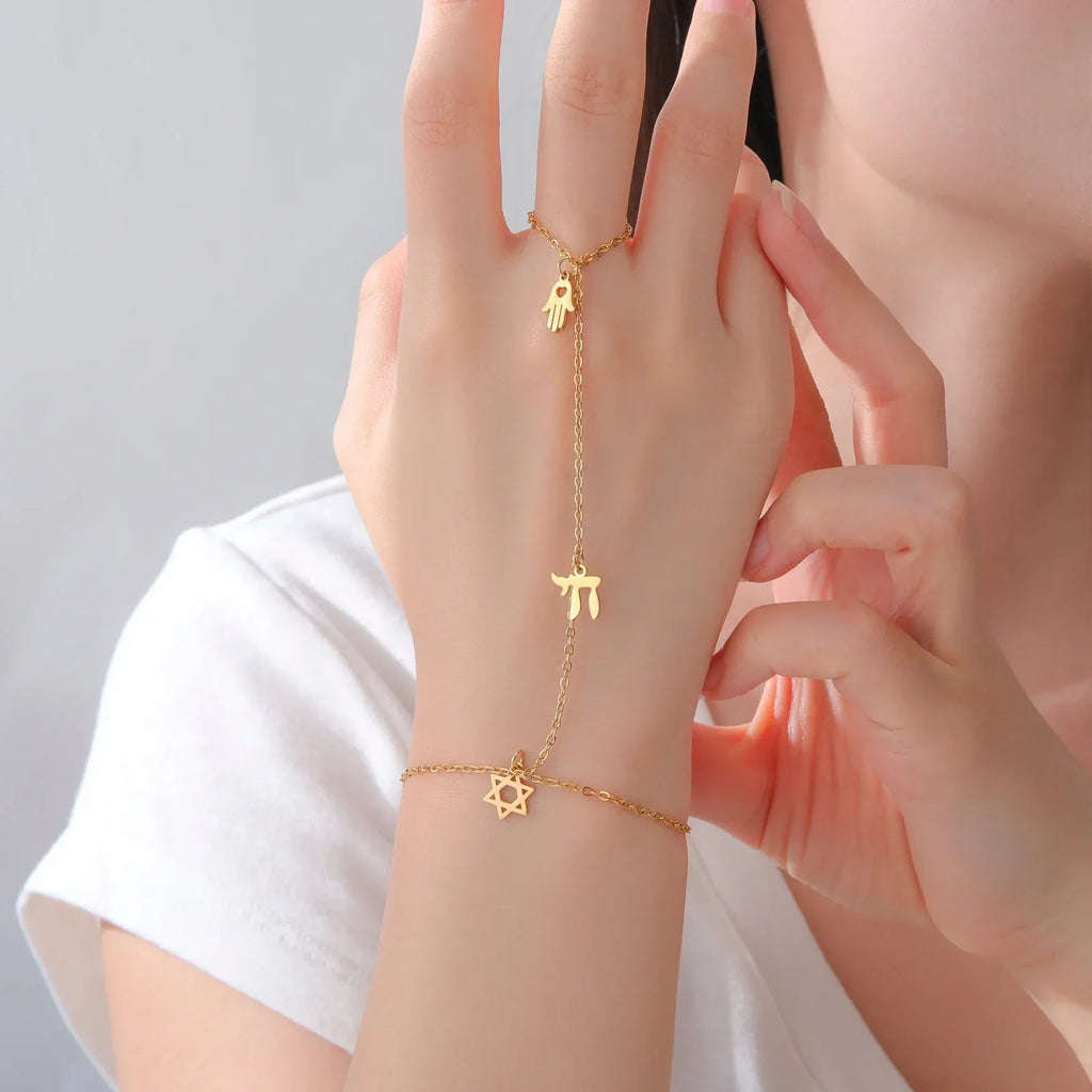 Hand and finger bracelet with Chai, Star of David and Hamsa protective Jewish pendants, gold star