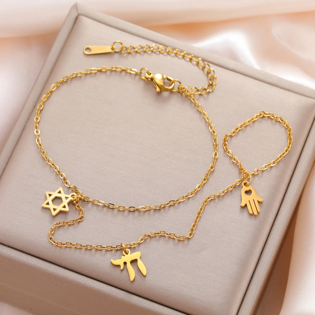 Hand and finger bracelet with Chai, Star of David and Hamsa protective Jewish pendants, gold star