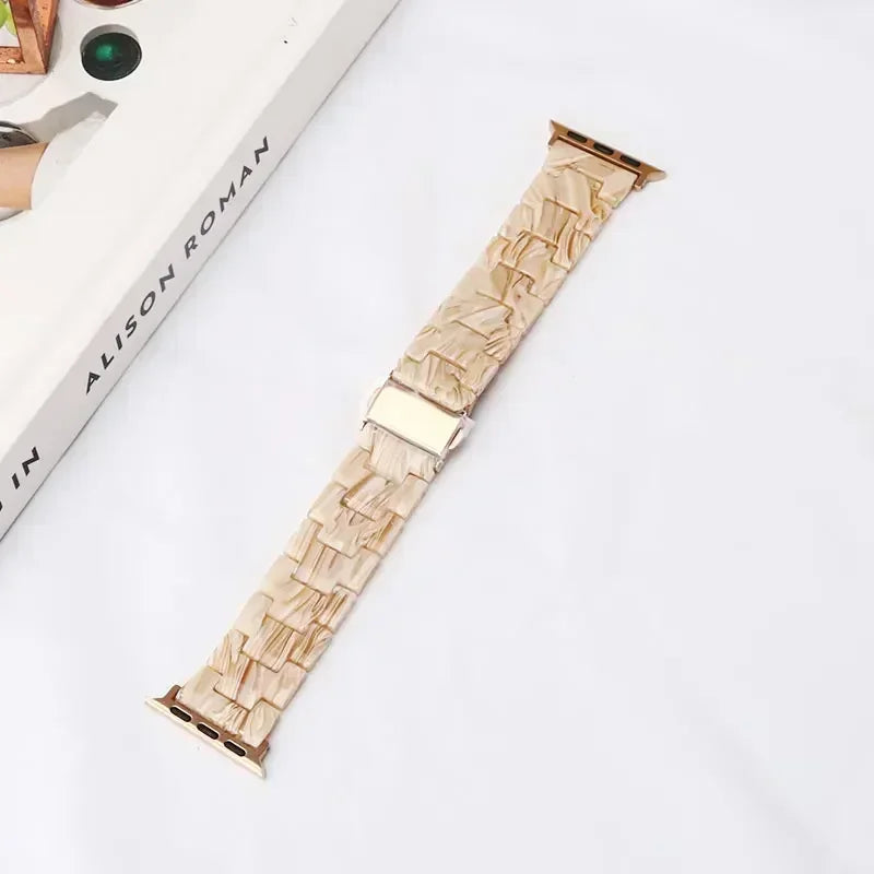 Replacement Apple Watch band in beige and gold resin