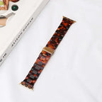 Replacement Apple Watch band in brown and gold resin
